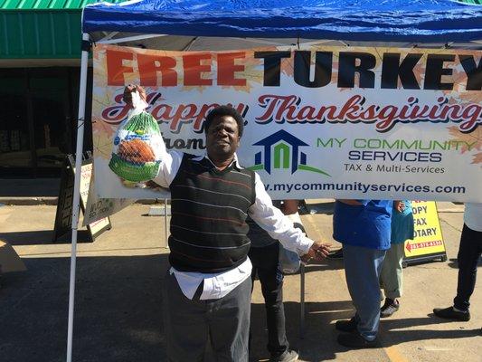 Another Happy Recipient of a free Turkey at MY Community TAX SERVICES. We love Alief