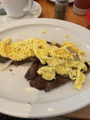 Steak w/eggs + onions