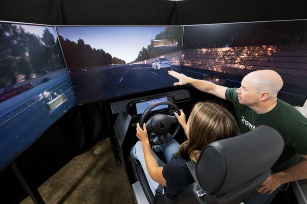 CEO and Co-Founder Jason guiding a new driver in the Greenlight simulator.