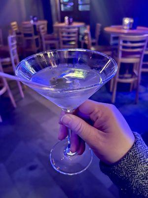 Dirty gin martini with blue cheese stuffed olives