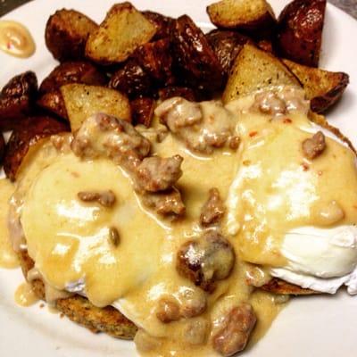 Poached eggs with a Cajun sausage spicy gravy