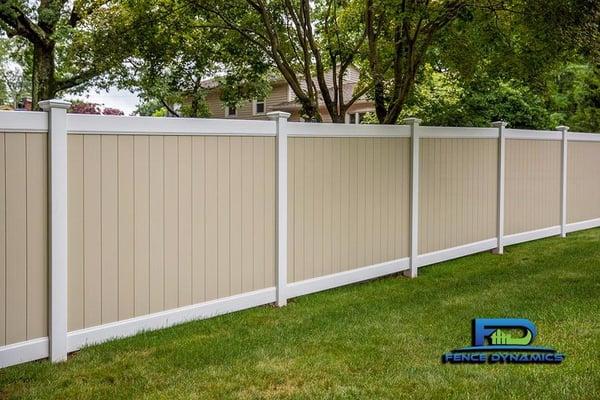 Two-tone vinyl privacy fencing available from Fence Dynamics.  Contact us today at 941-697-4448 to schedule your FREE in-home...