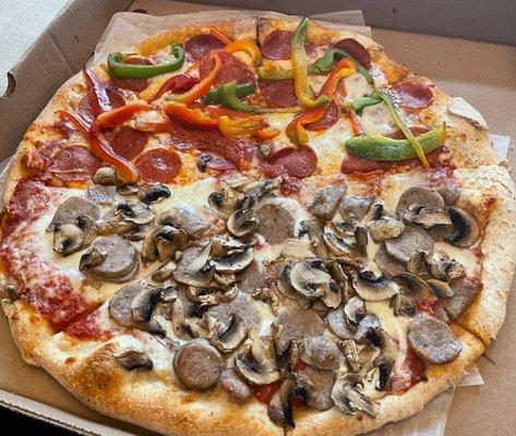 Large pizza - half sausage mushroom; half pepperoni green pepper