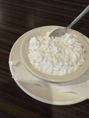 hard plastic piece in cottage cheese