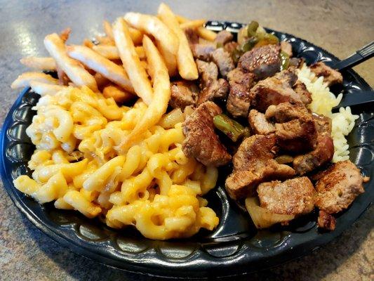 Souvlaki Tips with Peppers & Onions over Rice, French Fries & Macaroni n' Cheese. So, so good!