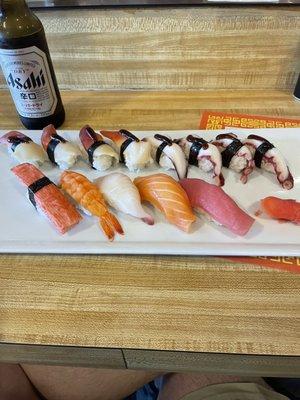 Sushi sampler add surf clams and octopus sushi. Italian brewed Asahi dry hopped Japanese beer.