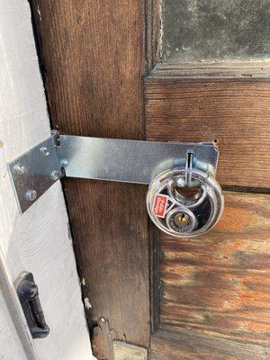 Padlock installation with one way/security screws