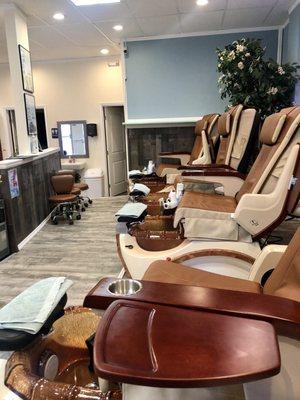 Pedicure chairs, about 5 of them