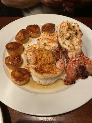 Seafood Feast! Sea scallops, orange roughy, crab cake, lobster tail, and jumbo shrimp.