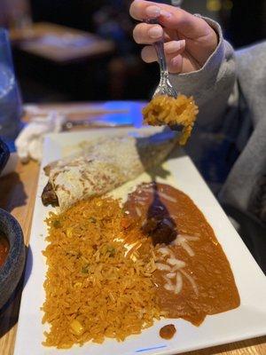 Carne quesadilla with rice and beans.