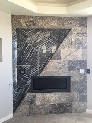 Fireplace Wall w/ Silver Travertine & Porcelain Accent Tile.