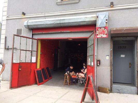 Look for the red doors. It's like a tunnel to beer.