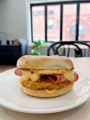 The basic breakfast sandwich. BELEAF bacon, JUSTegg, vegan cheddar, served on an English muffin with our house made chipotle aioli.