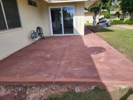 New patio, stamped with seamless Corse Granite pattern.