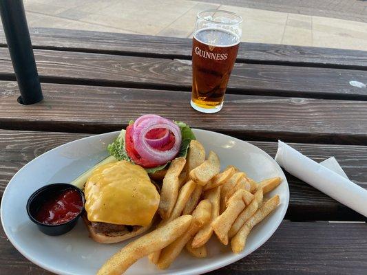 Cheese burger and fries with a pint of Pride #LondonPride