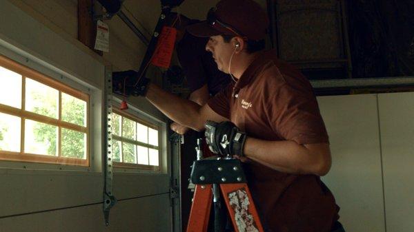 Hector and Omar on a garage door installation (w/ new springs) in Indio.