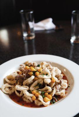 Three-Pepper Sweet & Spicy Calamari  crispy fried aleppo pepper calamari with a sweet and spicy chili sauce, sweety drop peppers