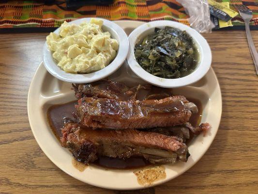 Pork Ribs, Potato Salad and Mixed Greens.