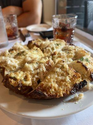 Crabby cheese bread (sourdough, garlic, cheese, shredded crab meat)