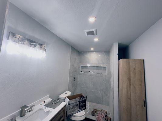 Exhaust fan installed light fixture and recessed lights