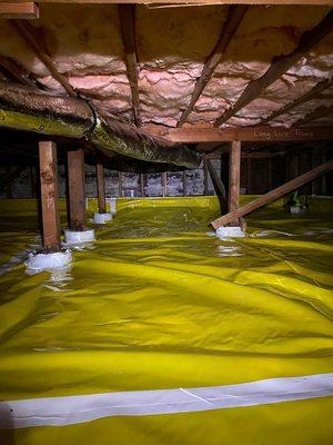 Vapor Barrier and Fiberglass batts in crawl space.