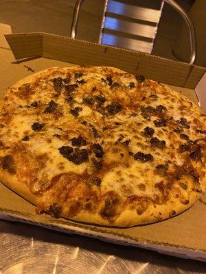 Medium cheese and sausage pizza.