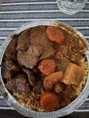 Beef stew with yellow rice