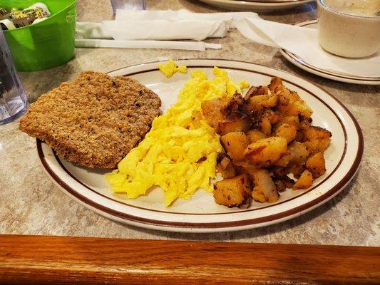 Chicken fried steak, eggs and potatoes