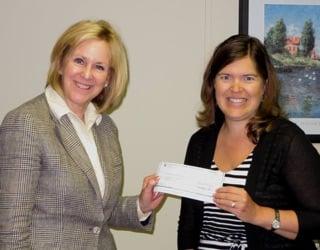 Check presentation for Katie Pikkarainen State Farm donation to the United Way Day of Caring