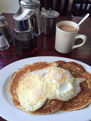 No. 6 on the breakfast menu. Two pancakes, two eggs any style and coffee or tea. All for $4.50 Breakfast is served 6am-11am.