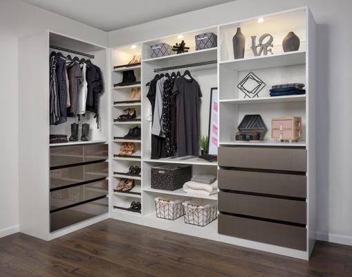 White finish with contrasting drawers.  Closet lighting