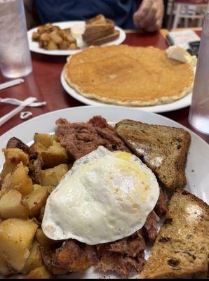 Corned Beef hash, home fries, toasts eggs and buttermilk pancake.