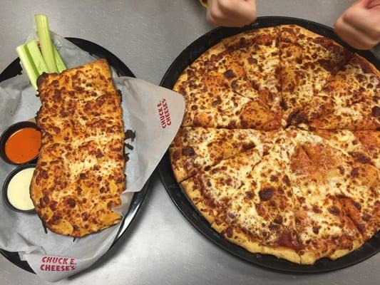 Cheese pizza, chicken filled cheese sticks, celery, and ranch and bbq dipping sauces. Really good!