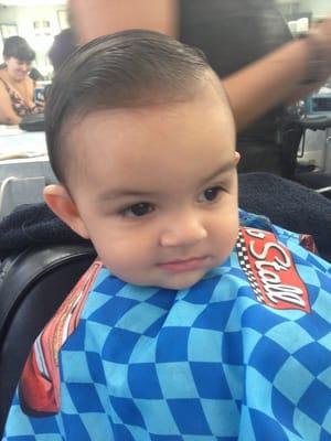 Baby's first haircut, Delia was so patient and sweet. She gave him a certificate, took pictures and made the event very special.