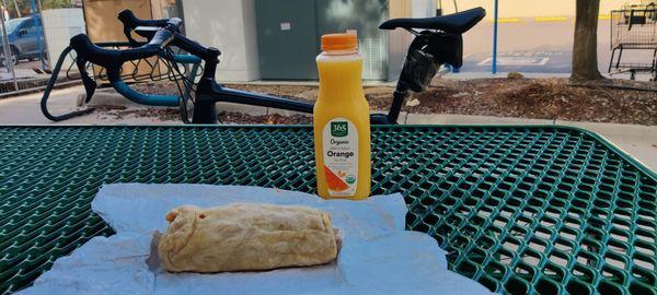 Yummy breakfast burrito and OJ