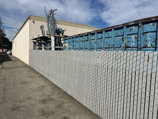 Commercial Chainlink with Grey Privacy Slats. Whether your project is big or small-  we can help!