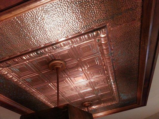 Solid copper above kitchen island.... light box with pendants