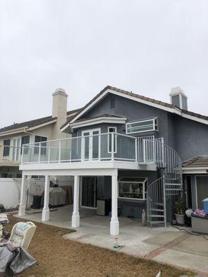 Deck replacement and updated to include stairs, lighting and new size.