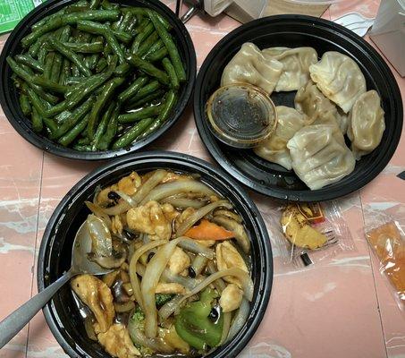 Sautéed string beans, chicken in black bean sauce, steamed pork dumplings. YUM!!