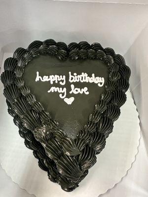 Color/icing: Black whipped icing  Cake: white  Style: Heart-shaped