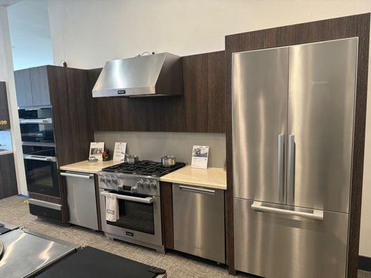 Miele 36" Range, Miele French door refrigerator, Miele speed oven, Miele wall oven and warming drawer, 2 Miele dishwasher