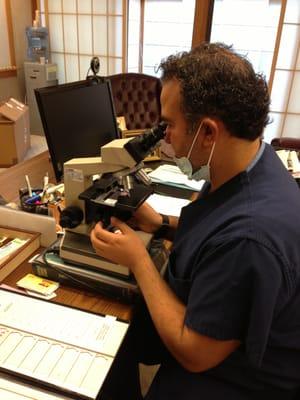 Dr. Levy Viewing Skin Cancer in Tissue