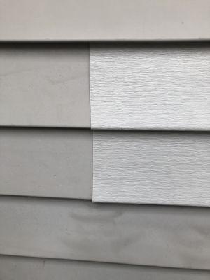 Replacement siding doesn't match in color or texture and it was cut unevenly