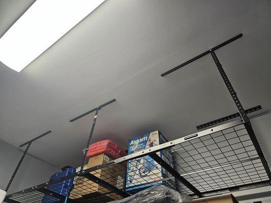 Garage overhead storage system