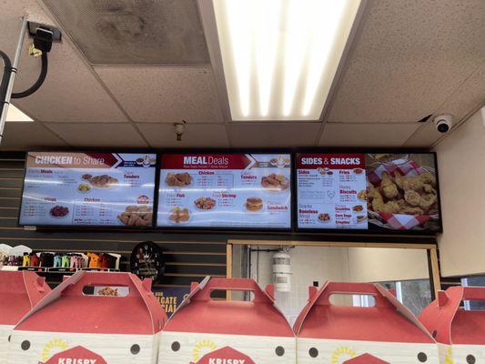 Krispy Krunchy Chicken menu inside the gas station.