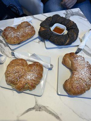 Nutella roll, jam roll, black olive and poppyseed bagel