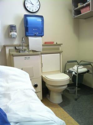 This is a room in ICU at Duke Raleigh. No bathrooms, just a toilet and sink in the room. No privacy at all.