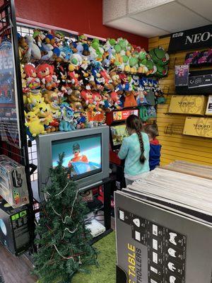 Wall of stuffed animals and demo in action