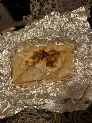 This is the quesadilla I ordered...the heck is this?! I didn't order a cheese chicken tortilla sandwich cut into two triangles.