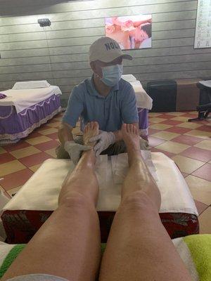 Foot reflexology massage. Holy cow it was awesome!